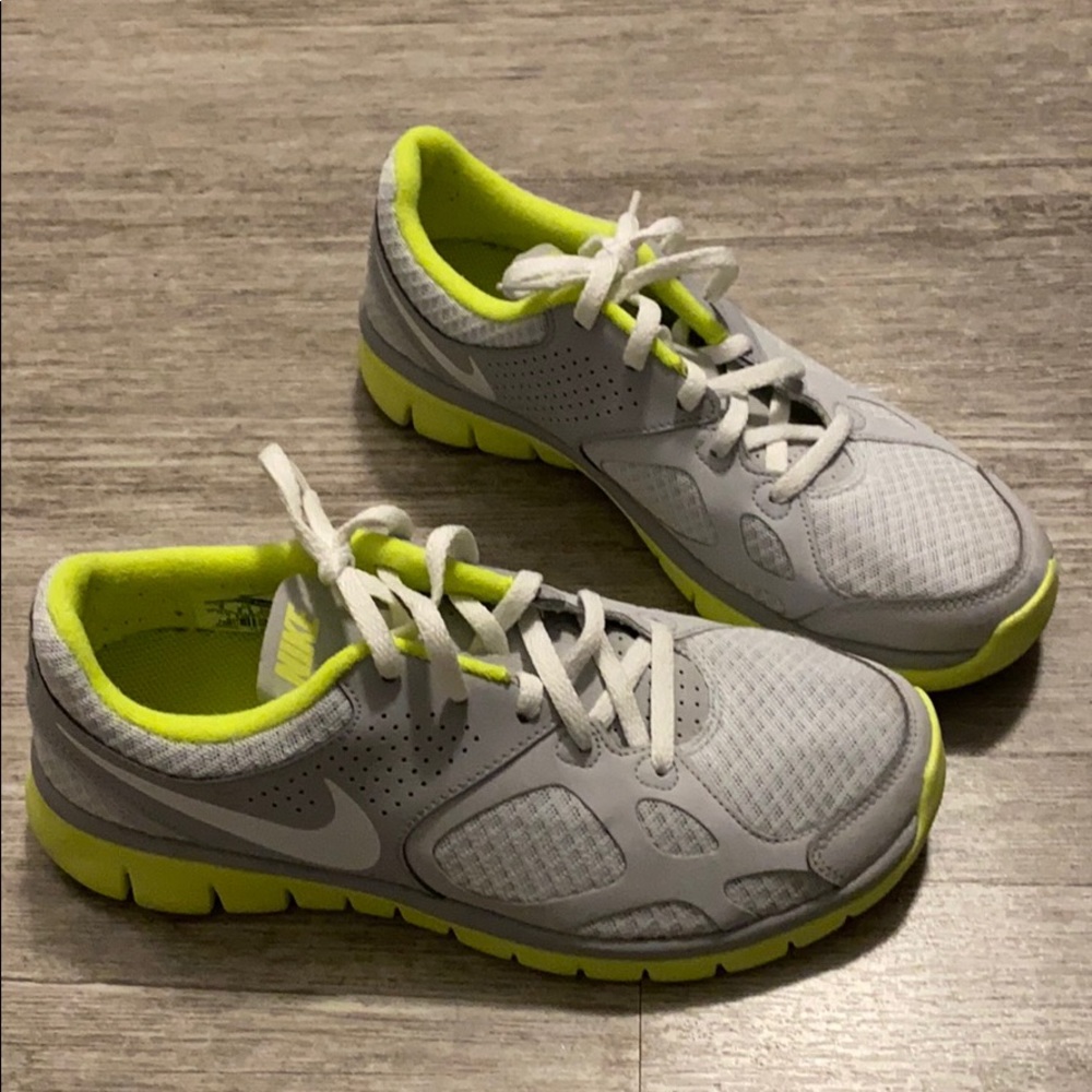 Grey and neon yellow Nike sneakers